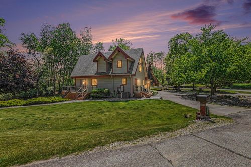 2000 Granada Ct, Weidman, MI, 48893-9387 | Card Image