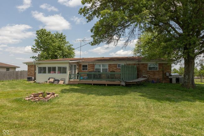 rear view of house with a deck | Image 24