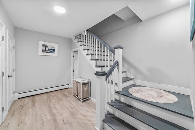 Staircase headed down to the lower level. | Image 30