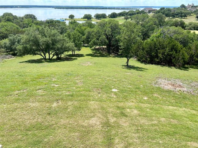 View of grassy yard with a water view | Image 4