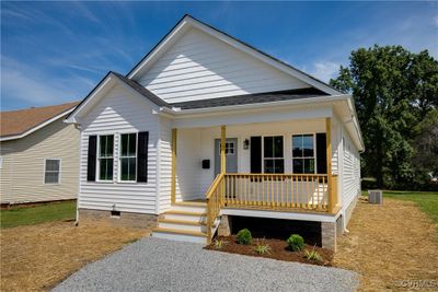 View of front of home featuring central AC unit and a porch | Image 3