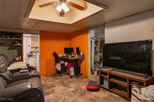 Office space featuring ceiling fan | Image 10