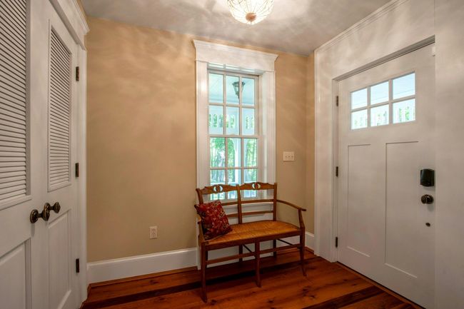Entryway featuring wood-type flooring and baseboards | Image 4