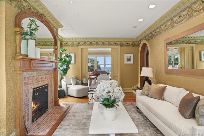 FRONT PARLOR // Enjoy water views, Bradbury &amp; Bradbury wall covering. wood burning fireplace with gas assist. | Image 7
