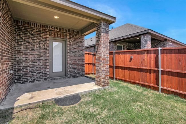 View of yard featuring a patio area | Image 27