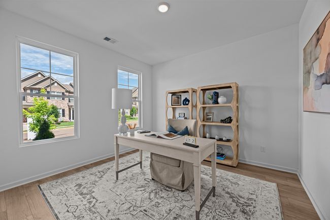 The two front windows are massive and let in a ton of natural light | Image 8