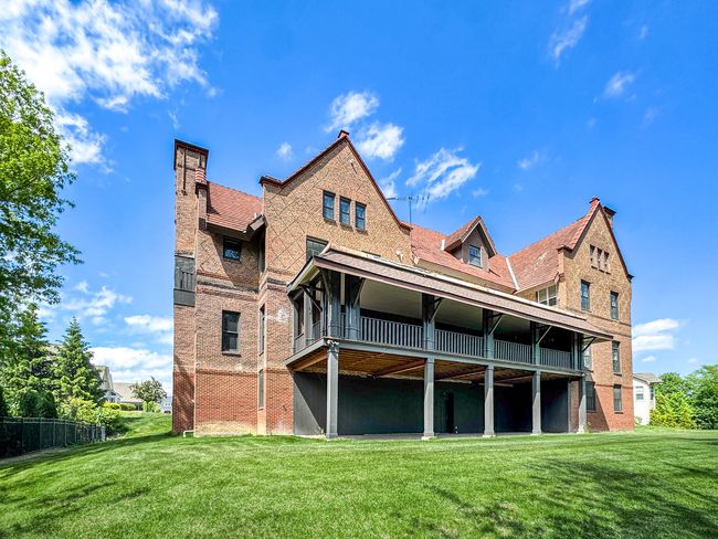 This home offers multiple decks and a covered terr | Image 37
