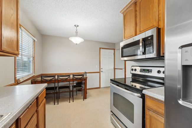 11749 Crooked Lake Blvd Nw, House other with 4 bedrooms, 1 bathrooms and null parking in Coon Rapids MN | Image 12