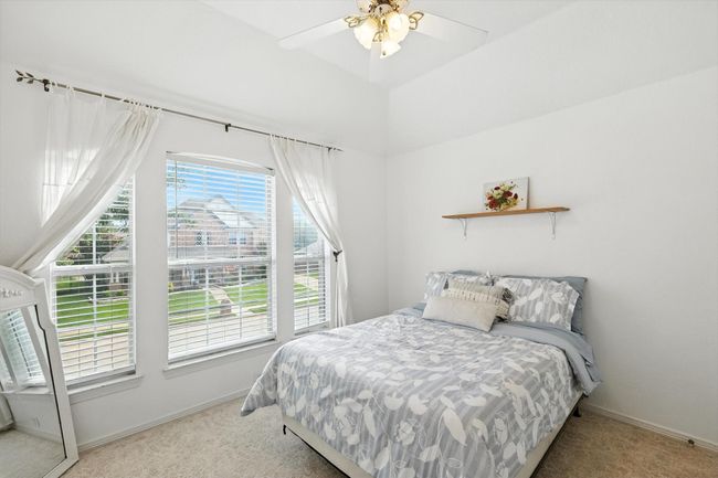 Bedroom featuring carpet flooring and a ceiling fan | Image 28