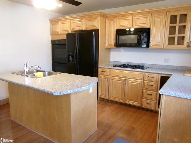 102 E 12 Th St, Home with 3 bedrooms, 2 bathrooms and 2 parking in Atlantic IA | Image 6