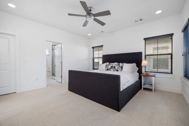 Bedroom with carpet, visible vents, baseboards, and recessed lighting | Image 31