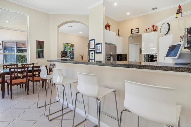 3848 Oak Ridge Cir, House other with 4 bedrooms, 3 bathrooms and null parking in Weston FL | Image 28
