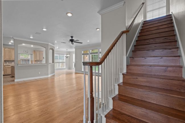 Grand staircase with wood flooring | Image 7
