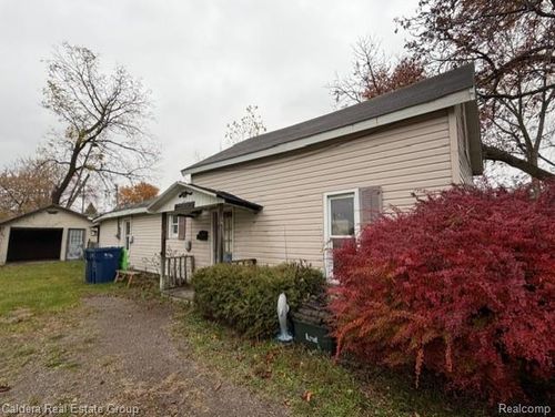 1407 Bradfield St, Bay City, MI, 48706-4103 | Card Image