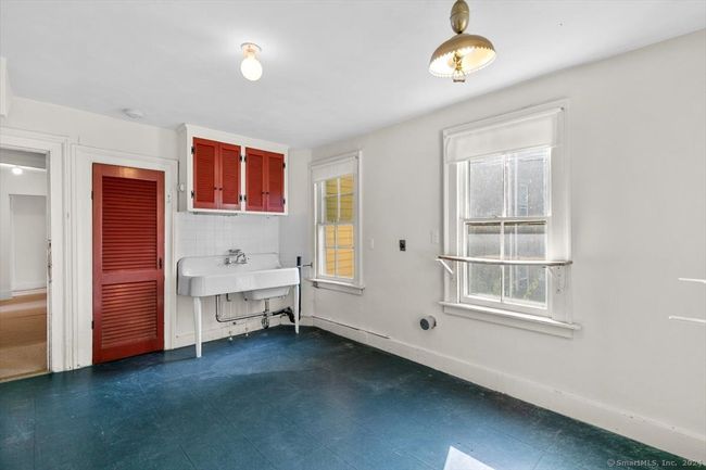 Laundry room or bonus room. Access to back outside stair | Image 18