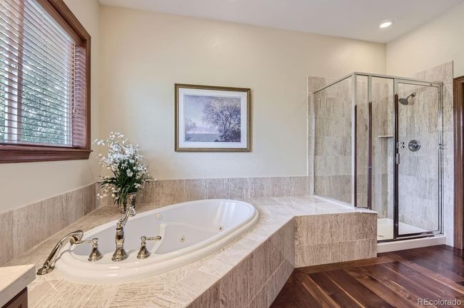 Shower in main floor primary suite bathroom! | Image 30