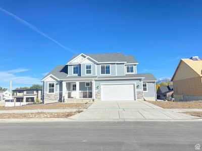 View of front of house featuring a garage | Image 1