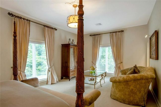 Bedroom with carpet floors | Image 20