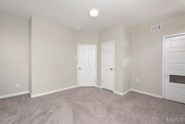 Unfurnished bedroom with carpet floors | Image 14