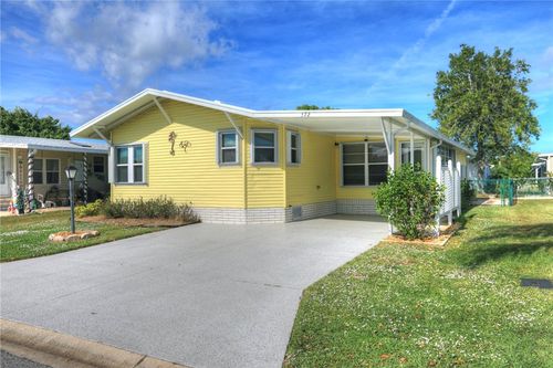 572 Dolphin Cir, Barefoot Bay, FL, 32976-2596 | Card Image