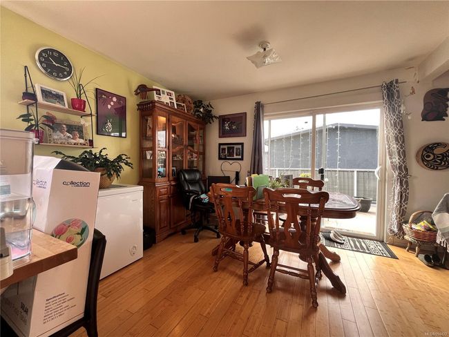 Dining room featuring light wood-type flooring | Image 6