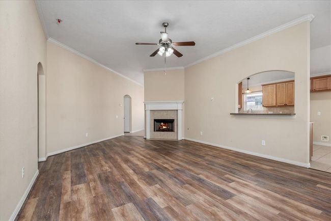 Living room area with a great fireplace. | Image 15