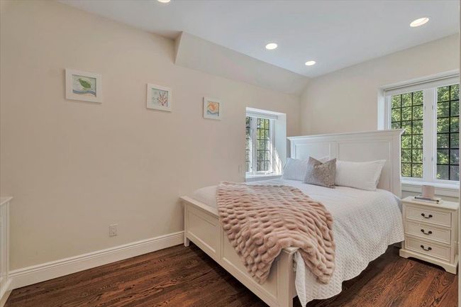 Sunny study off the family room, seen here decorated as a bedroom. | Image 9