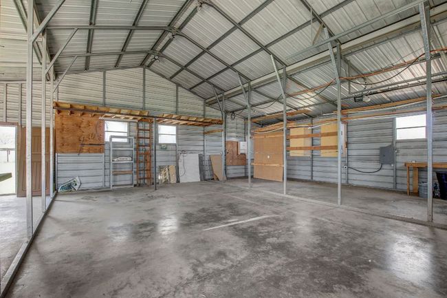 Garage with metal wall | Image 22