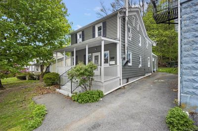 View of front of home featuring covered porch | Image 1