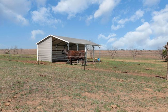 View of pole building featuring a yard and a rural view | Image 28