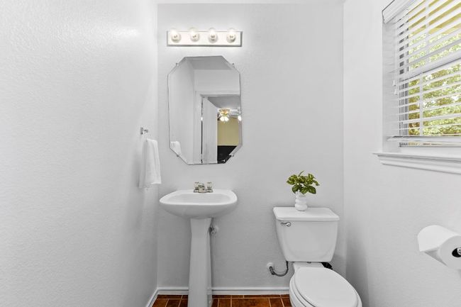 Half bath featuring toilet and baseboards | Image 22