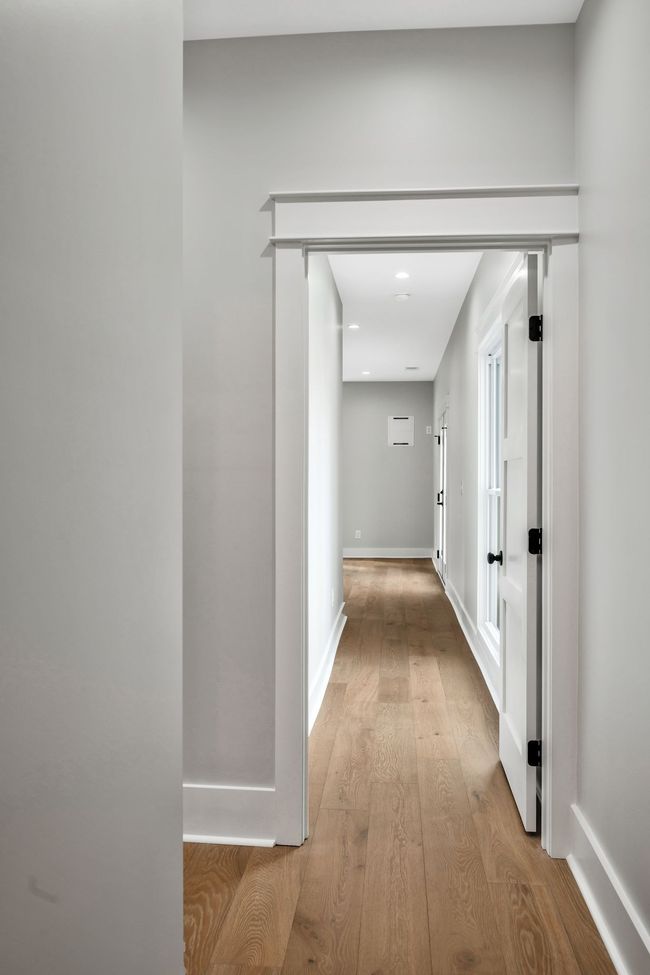 Hallway into the primary suite | Image 32