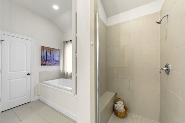 Another view of Master Bathroom showing separate shower and privacy tub for those relaxing moments! | Image 25