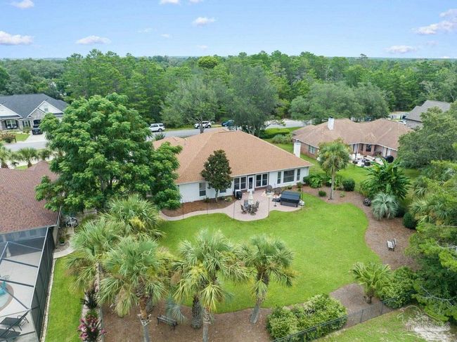 7008 Turnberry Cir, House other with 4 bedrooms, 2 bathrooms and 3 parking in Navarre FL | Image 62