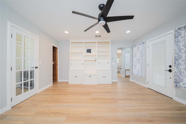 Unfurnished bedroom featuring light wood finished floors, recessed lighting, and ceiling fan | Image 21