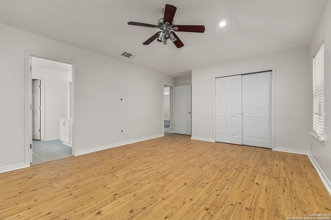 Master bedroom w/ two closets. | Image 11