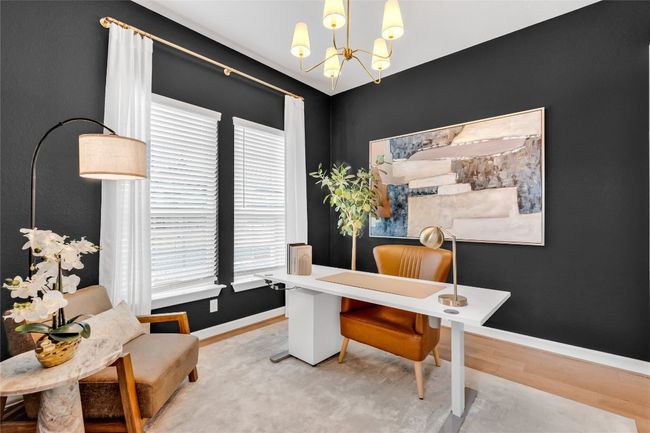 Office space featuring plenty of natural light, a chandelier, and light wood-type flooring | Image 19