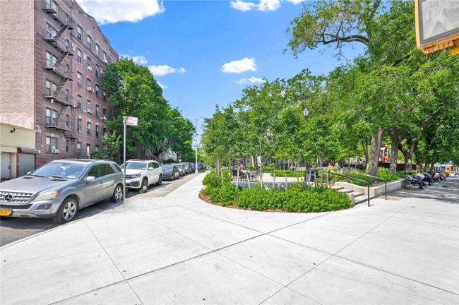 View of street featuring sidewalks and street lighting | Image 30
