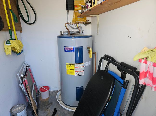 Utilities with electric water heater | Image 25