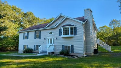 Beautiful Country Setting for this large Raised Ranch Home. | Image 1