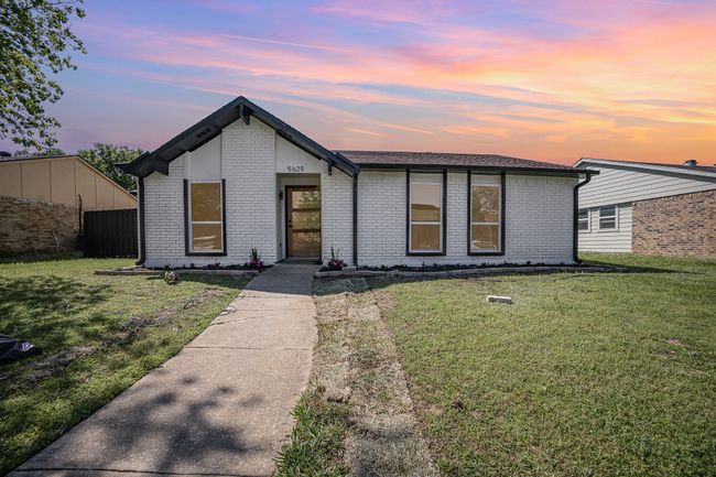 Mid-century modern home featuring brick siding | Image 4