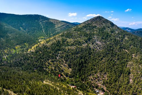 4253 Woods Creek Rd, Wolf Creek, MT, 59648-8543 | Card Image