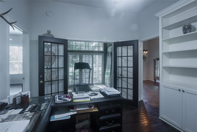 Office with french doors and dark wood-style flooring | Image 23