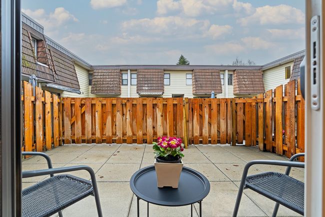 View of patio featuring fence | Image 26