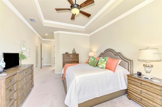 Spacious Primary Suite with Tray Ceiling & Crown Molding | Image 40