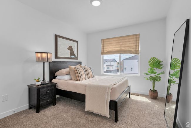 Carpeted bedroom featuring baseboards | Image 10