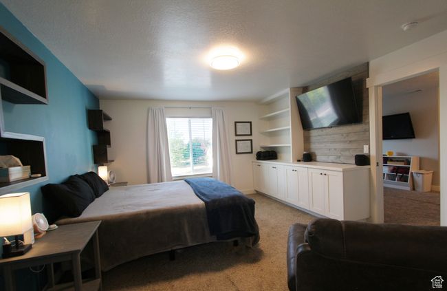 Bedroom with light colored carpet | Image 17