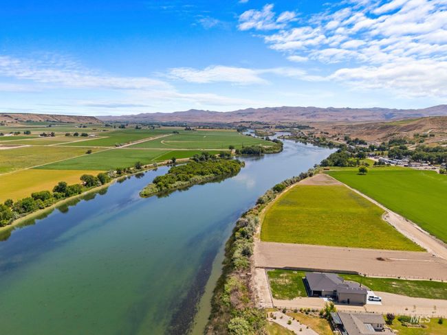 Bird's eye view of a water and mountain view | Image 44