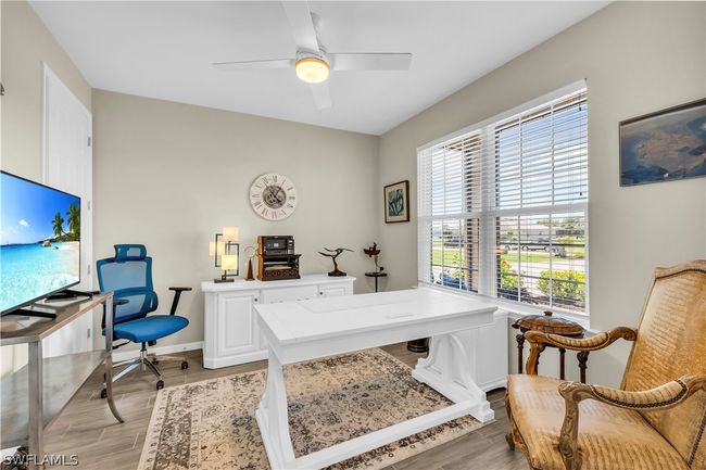 Sunny Den Overlooks the Front Lawn | Image 25