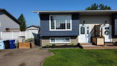 144 Cruickshank Rd, Home with 4 bedrooms, 2 bathrooms and 2 parking in Fort Mcmurray AB | Image 1